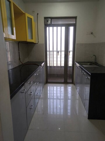 Kitchen in 2 BHK Apartment at Kalpataru Paramount, Kapur Bawdi – for Rent