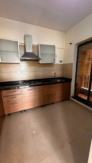 Kitchen in 2 BHK Apartment at Pride Park Springs, Dhanori – for Rent