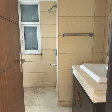 Bathroom in 4 BHK Apartment at Puri Diplomatic Greens Phase I, New Palam Vihar Phase 3 – for Rent