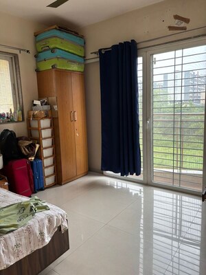 Bedroom in 2 BHK Apartment at Parshwa Raga, Lohgaon – for Rent