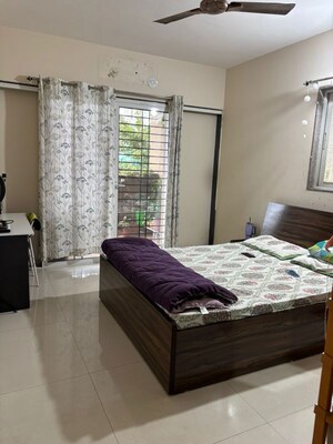 Bedroom in 2 BHK Apartment at Parshwa Raga, Lohgaon – for Rent