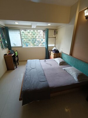 Bedroom in 4 BHK Apartment at Amity CHS, Andheri West – for Rent