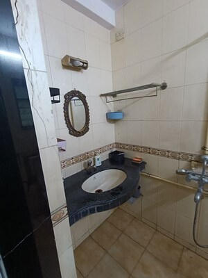 Bathroom in 4 BHK Apartment at Amity CHS, Andheri West – for Rent