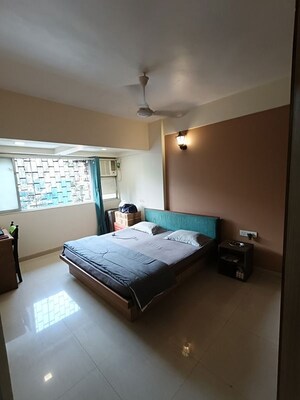Bedroom in 4 BHK Apartment at Amity CHS, Andheri West – for Rent
