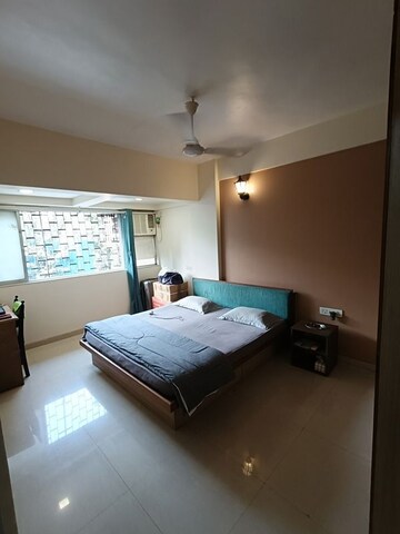 Bedroom in 4 BHK Apartment at Amity CHS, Andheri West – for Rent