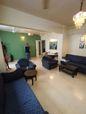 Living Room in 4 BHK Apartment at Amity CHS, Andheri West – for Rent