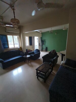 Living Room in 4 BHK Apartment at Amity CHS, Andheri West – for Rent