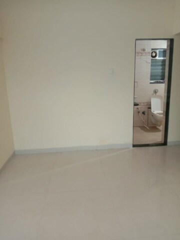 Master Bedroom in 3 BHK Apartment at Goregaon West – for Sale