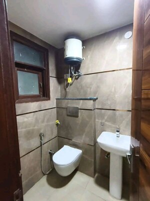 Bathroom in 2 BHK Builder Floor at Chattarpur – for Rent