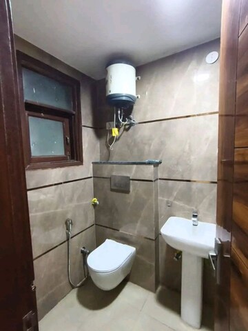 Bathroom in 2 BHK Builder Floor at Chattarpur – for Rent