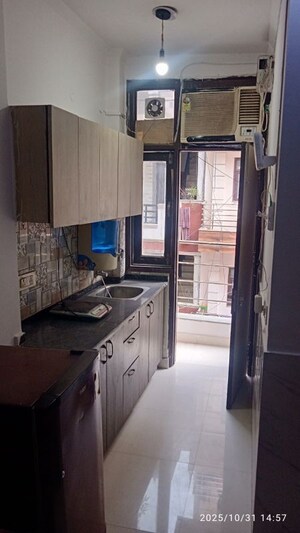 Kitchen in 1 RK Builder Floor at Minarch Tower, Sector 44 – for Rent