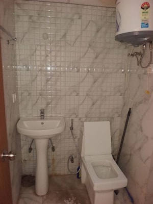Bathroom in Studio Apartment at Earthcon Beetle Suites, Chi V Greater Noida – for Rent