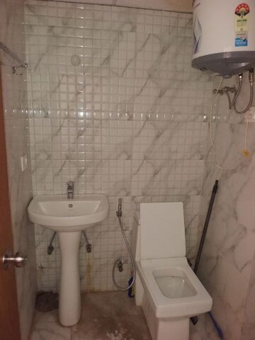 Bathroom in Studio Apartment at Earthcon Beetle Suites, Chi V Greater Noida – for Rent