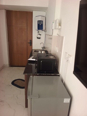Kitchen in Studio Apartment at Earthcon Beetle Suites, Chi V Greater Noida – for Rent