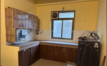 Kitchen in 3 BHK Apartment at Hazratganj – for Rent