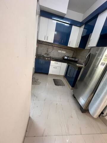 Kitchen in 2.5 BHK Apartment at Nimbus The Golden Palm, Sector 168 – for Rent