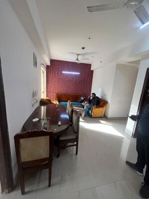 Living Room in 2.5 BHK Apartment at Nimbus The Golden Palm, Sector 168 – for Rent