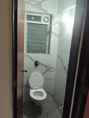 Bathroom in 1 BHK Apartment at Raunak Bliss, Ghodbunder Road – for Rent
