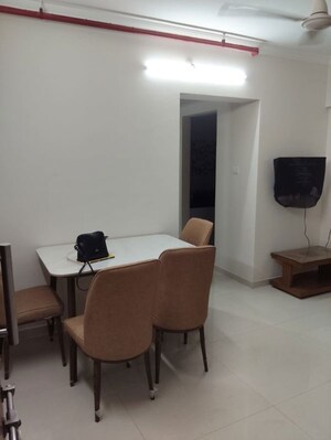 Living Room in 1 BHK Apartment at Raunak Bliss, Ghodbunder Road – for Rent