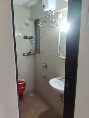 Bathroom in 1 BHK Apartment at Raunak Bliss, Ghodbunder Road – for Rent