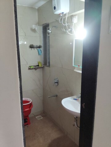 Bathroom in 1 BHK Apartment at Raunak Bliss, Ghodbunder Road – for Rent