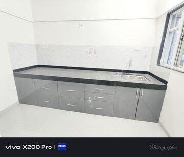 Kitchen in 2 BHK Apartment at Wadgaon Sheri – for Rent