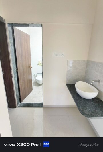 Bathroom in 2 BHK Apartment at Wadgaon Sheri – for Rent