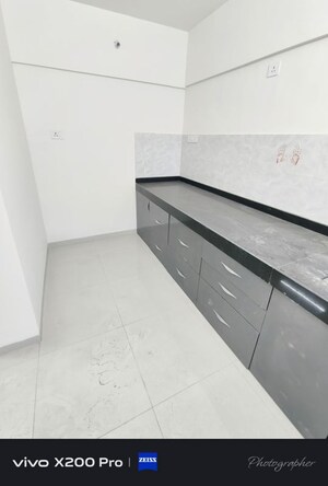 Kitchen in 2 BHK Apartment at Wadgaon Sheri – for Rent