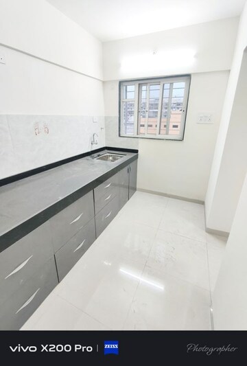Kitchen in 2 BHK Apartment at Wadgaon Sheri – for Rent