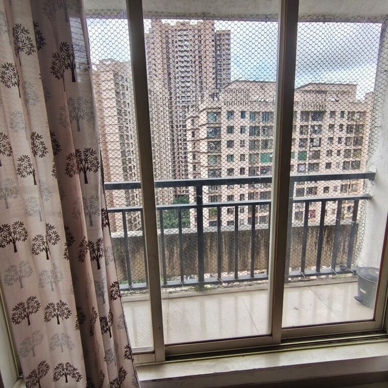 Balcony, rosa-gardenia 1.5 Bedroom 500 Sq.Ft. Apartment In Ghodbunder Road Thane 10014745