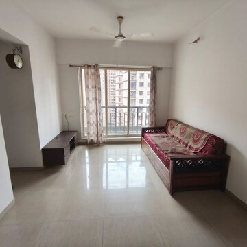 Living Room in 1.5 BHK Apartment at Rosa Gardenia, Ghodbunder Road – for Rent