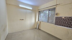 Room in 1 BHK Apartment at Haridwar CHS Malad, Malad West – for Rent