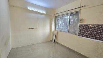 Room in 1 BHK Apartment at Haridwar CHS Malad, Malad West – for Rent