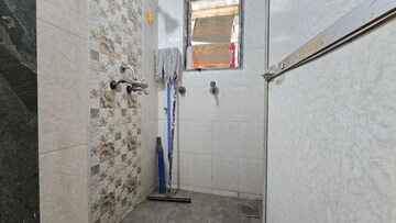 Bathroom in 1 BHK Apartment at Haridwar CHS Malad, Malad West – for Rent