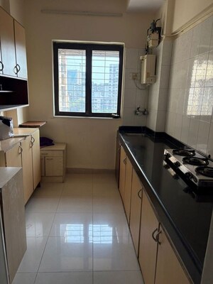 Kitchen in 2 BHK Apartment at Royal Classic Co Op Society, Andheri West – for Rent