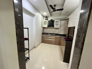 Kitchen in 2 BHK Apartment at Pride Park Royale, Andheri East – for Rent