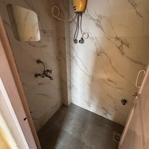 Bathroom in 1 BHK Apartment at Goregaon East – for Rent