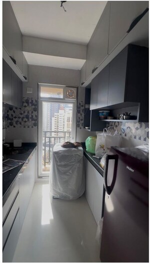 Kitchen in 1 BHK Apartment at Raunak Bliss, Ghodbunder Road – for Rent