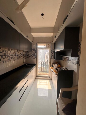Kitchen in 1 BHK Apartment at Raunak Bliss, Ghodbunder Road – for Rent