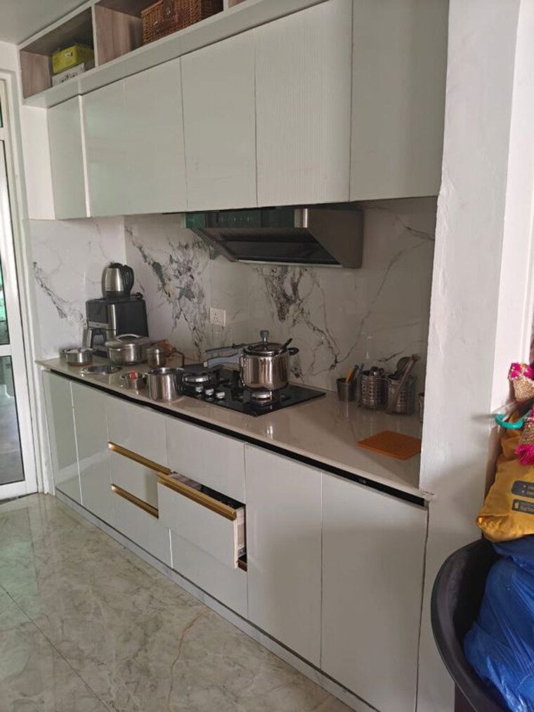 Kitchen, unitech-uniworld-gardens-2 3 Bedroom 1355 Sq.Ft. Apartment In Sector 47 Gurgaon 10015123