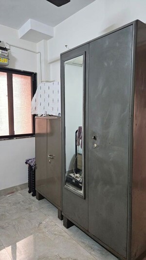Bathroom in 3 BHK Apartment at Satya Vandan CHS, Kailash Nagar – for Rent