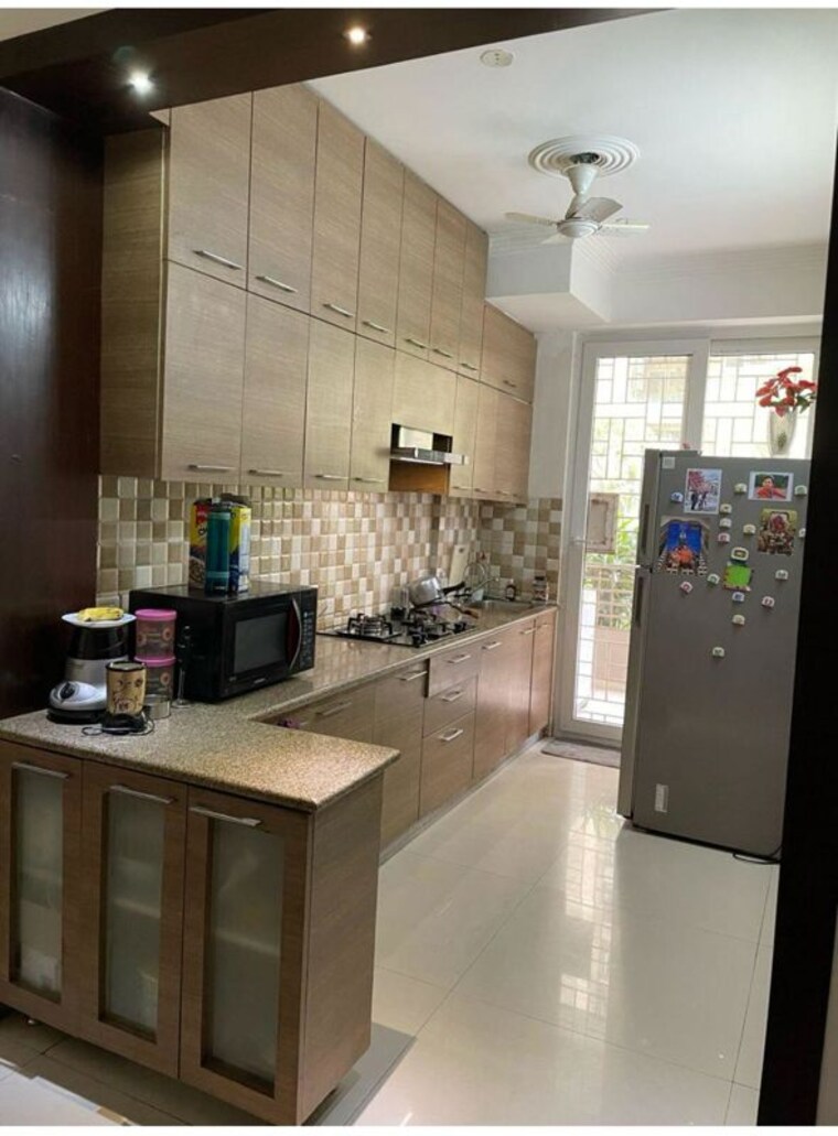 Kitchen, tulip-violet 3 Bedroom 1608 Sq.Ft. Apartment In Sector 69 Gurgaon 10015293