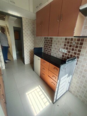 Kitchen in 2 BHK Apartment at Om Sai Plaza, Ghodbunder Road – for Rent