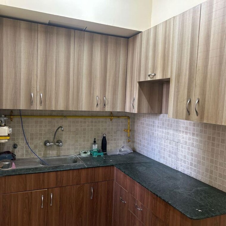 Kitchen, jaypee-greens-kosmos 2 Bedroom 945 Sq.Ft. Apartment In Sector 134 Noida 10018444