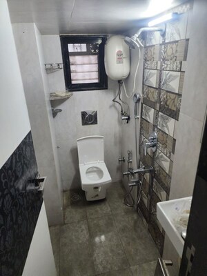 Bathroom in 2.5 BHK Apartment at Oberoi Realty Woods, Goregaon East – for Sale
