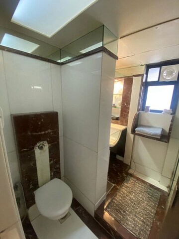 Bathroom in 6 BHK Apartment at Mystique Rose Apartment, Santacruz West – for Rent