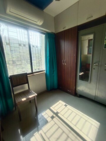 Bedroom in 1 BHK Apartment at Parijat Gardens Marigold CHS, Kasarvadavali – for Rent