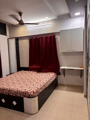 Bedroom in 2 BHK Apartment at Lalani Residency, Kavesar – for Rent