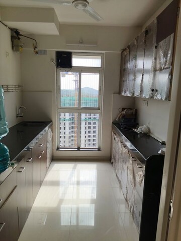 Kitchen in 1 BHK Apartment at Puraniks Tokyo Bay Phase 2, Kasarvadavali – for Rent