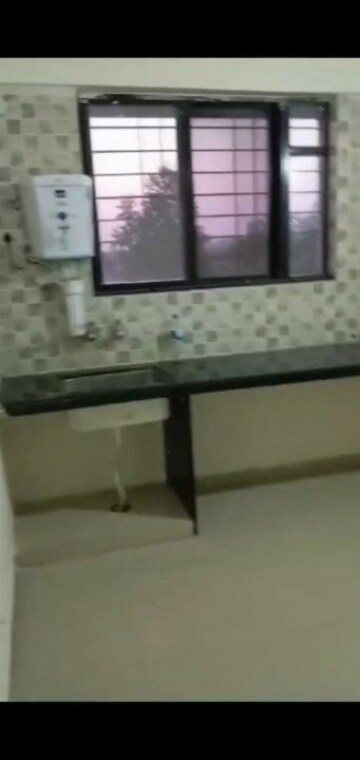 Kitchen in 1 BHK Apartment at Alankar Society Charholi Buduk, Charholi Budruk – for Rent